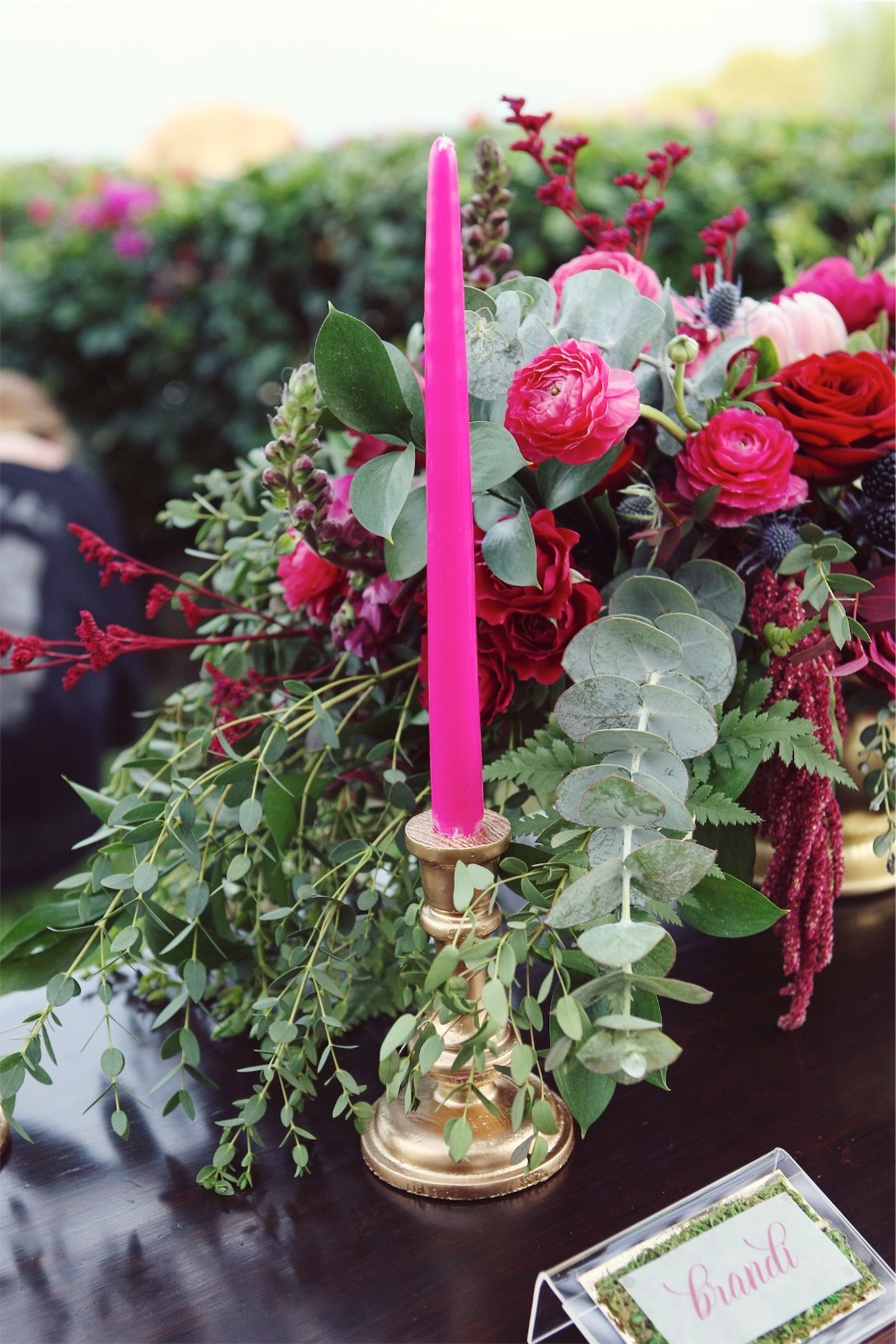 pink candle sticks in gold candle holders