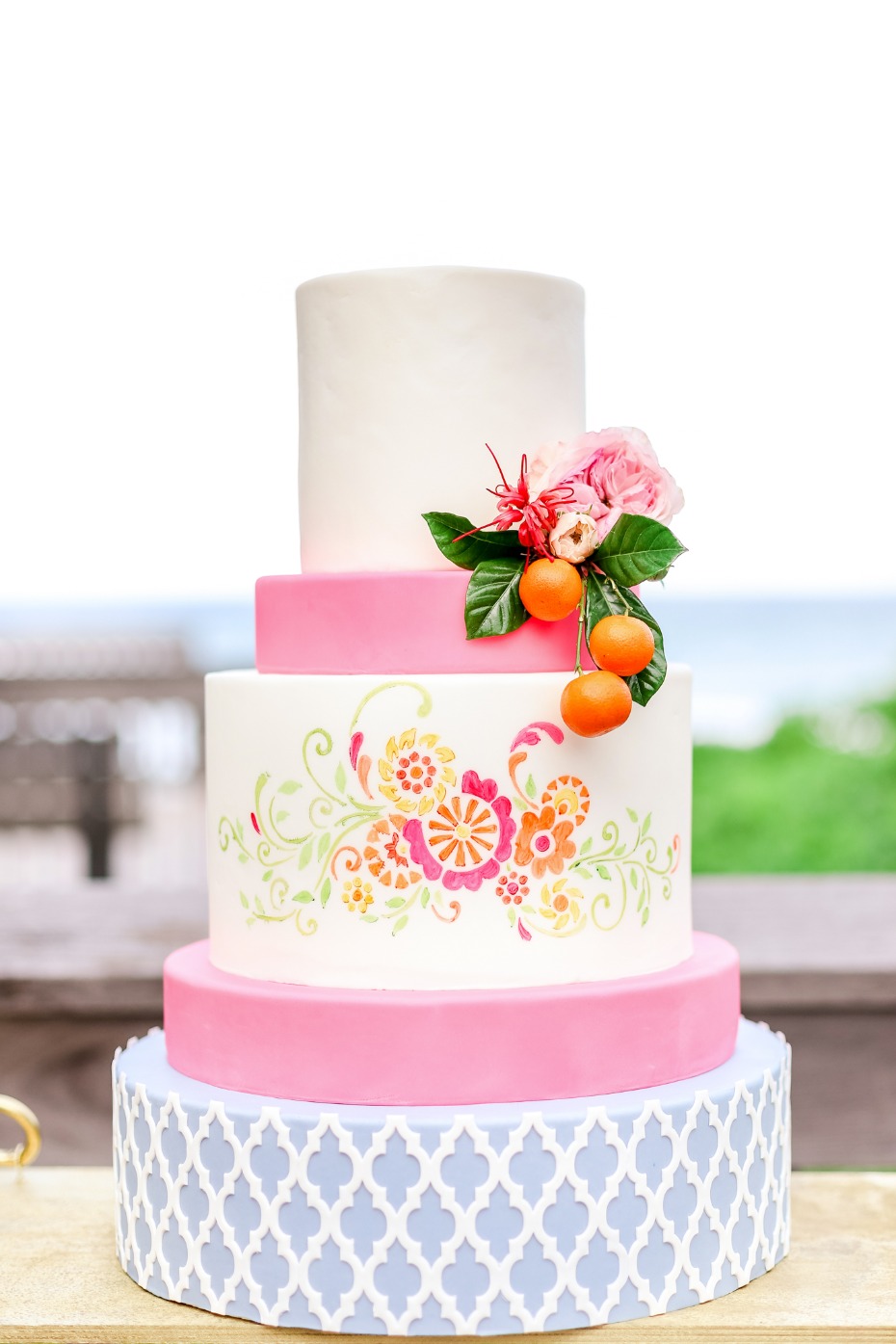 Bright and cheerful cake with pink, blue and white