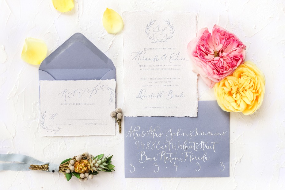 Wedding invitation with delicate floral and elegant calligraphy design