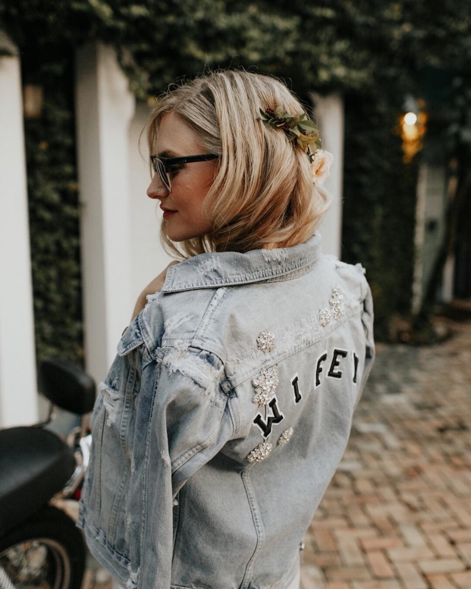Personalized wifey denim jacket sparkles on a bride