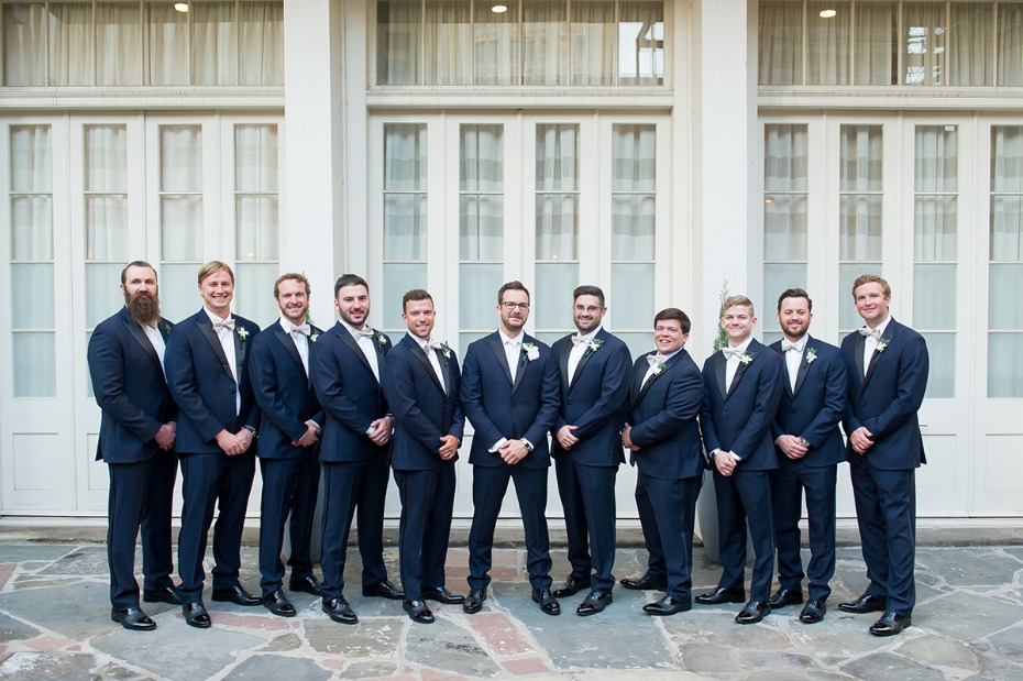 groom and his men in matching navy suits