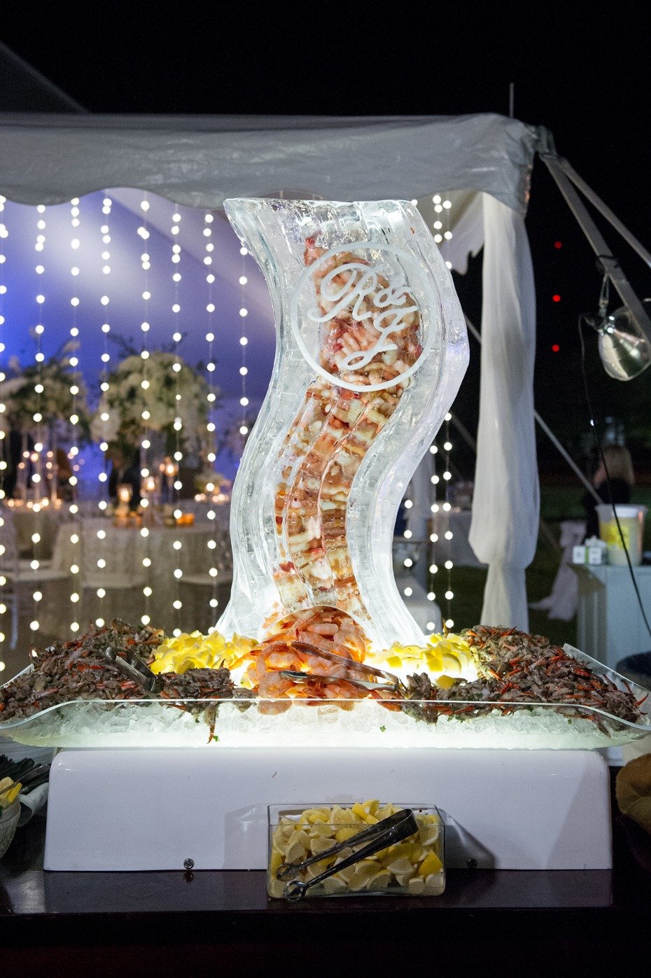 ice sculpture filled with shrimp
