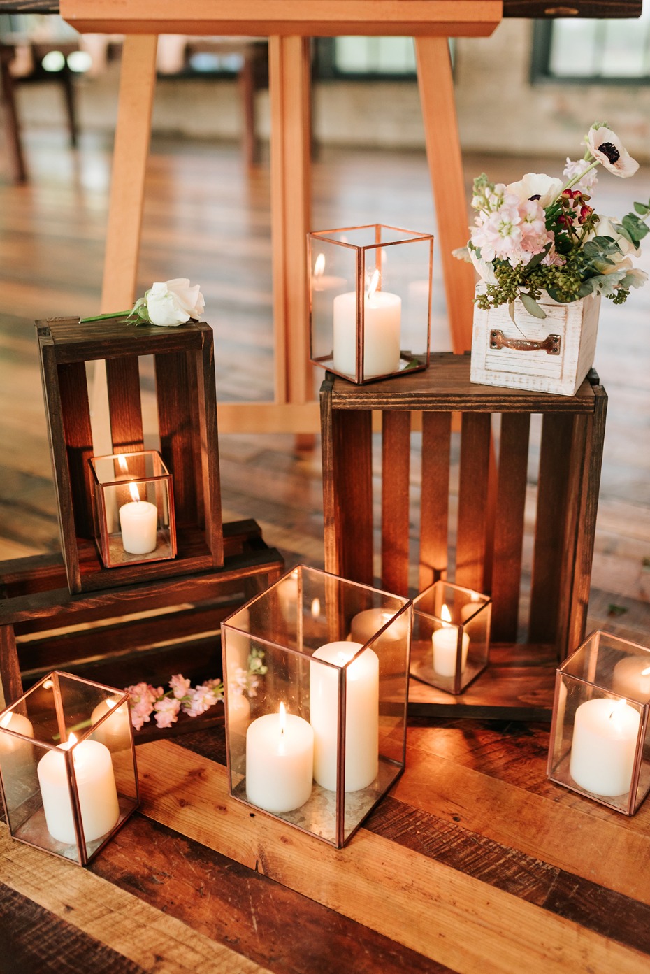 Elegant wedding decor with candles and floral arrangements