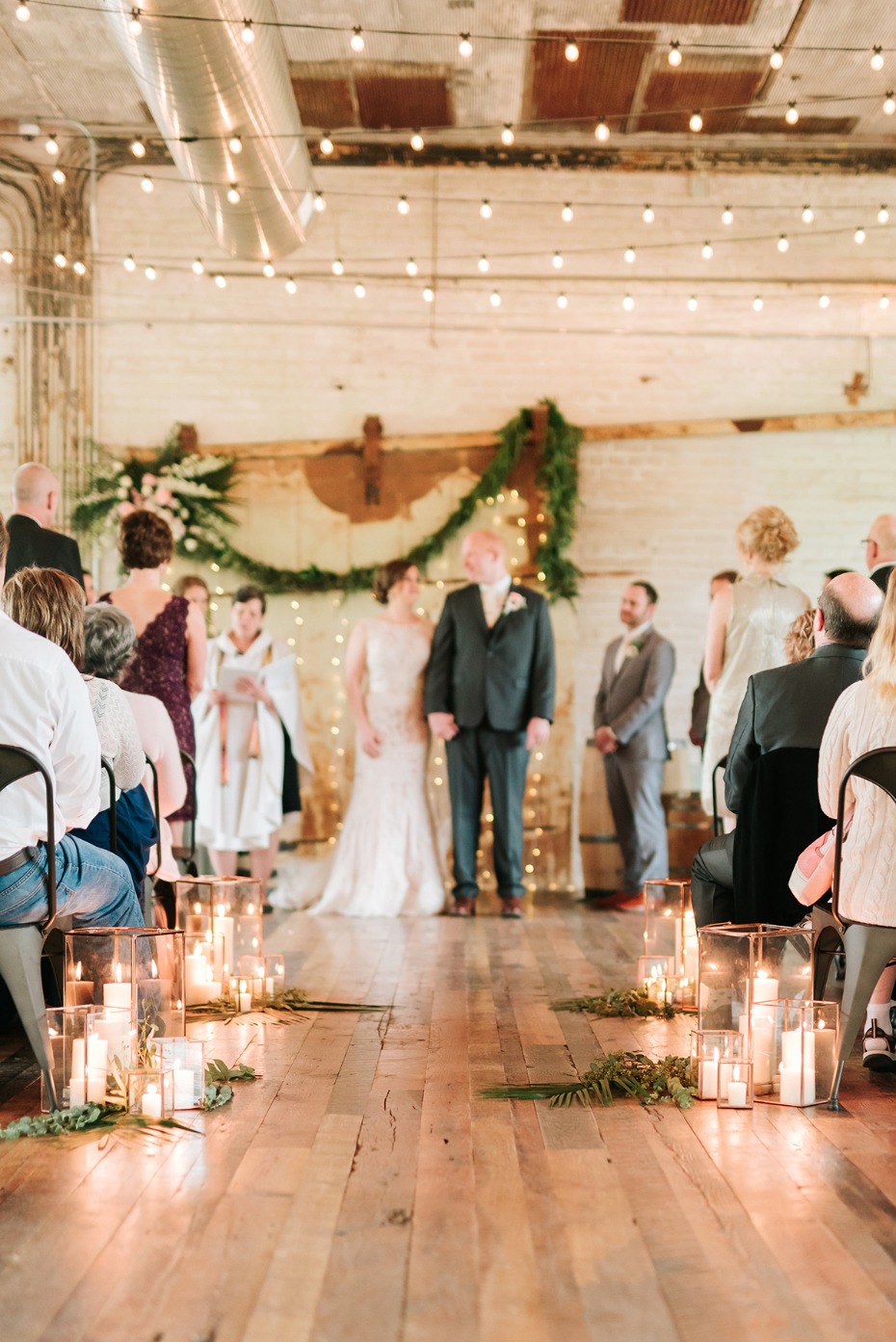 Bride and groom at industrial loft wedding ceremony