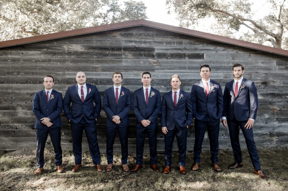Navy suits and red ties