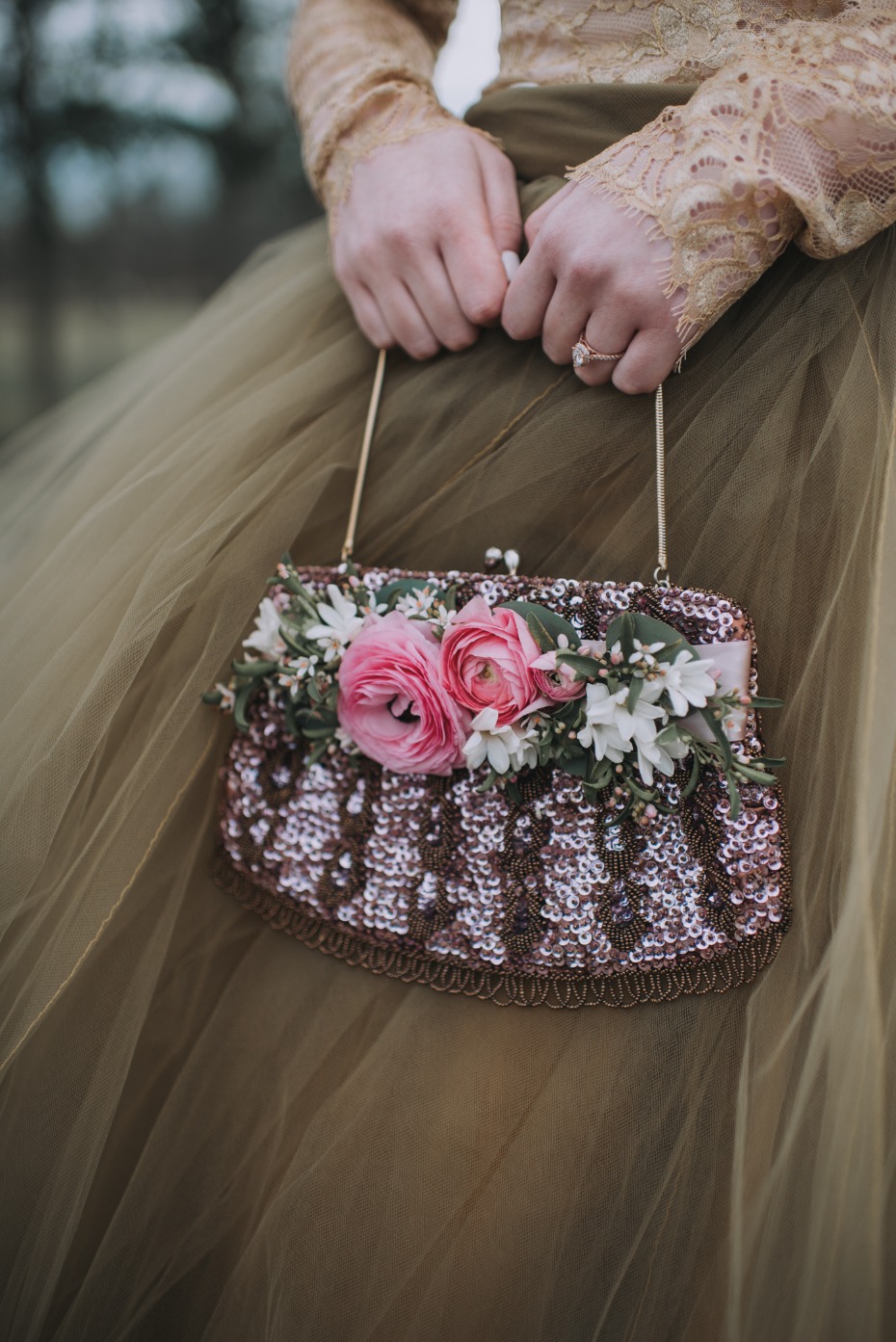 Sparkly flower accented handbag