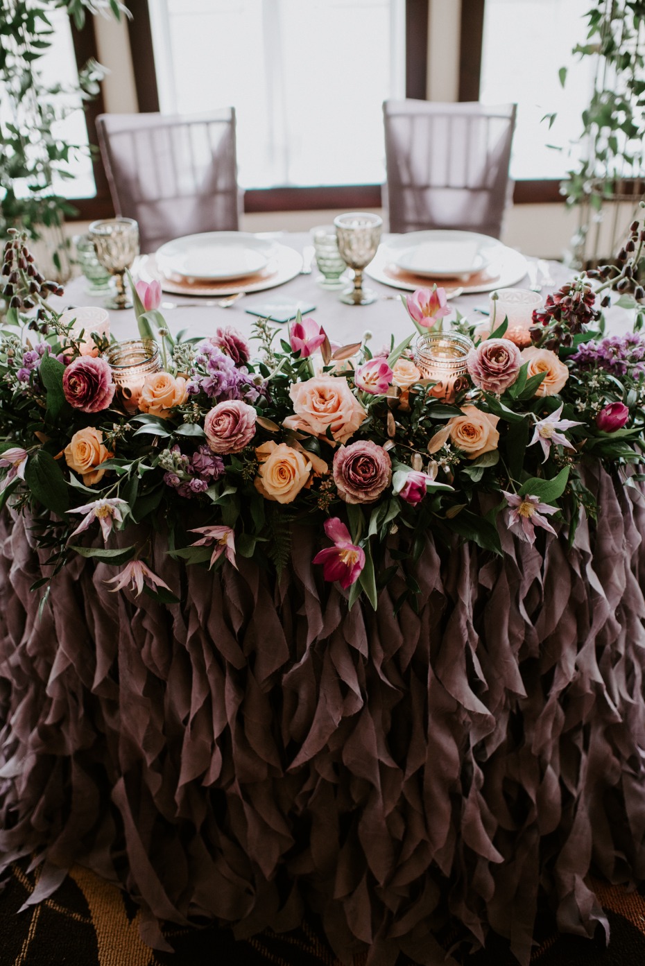 Sweetheart table with florals and ruffles