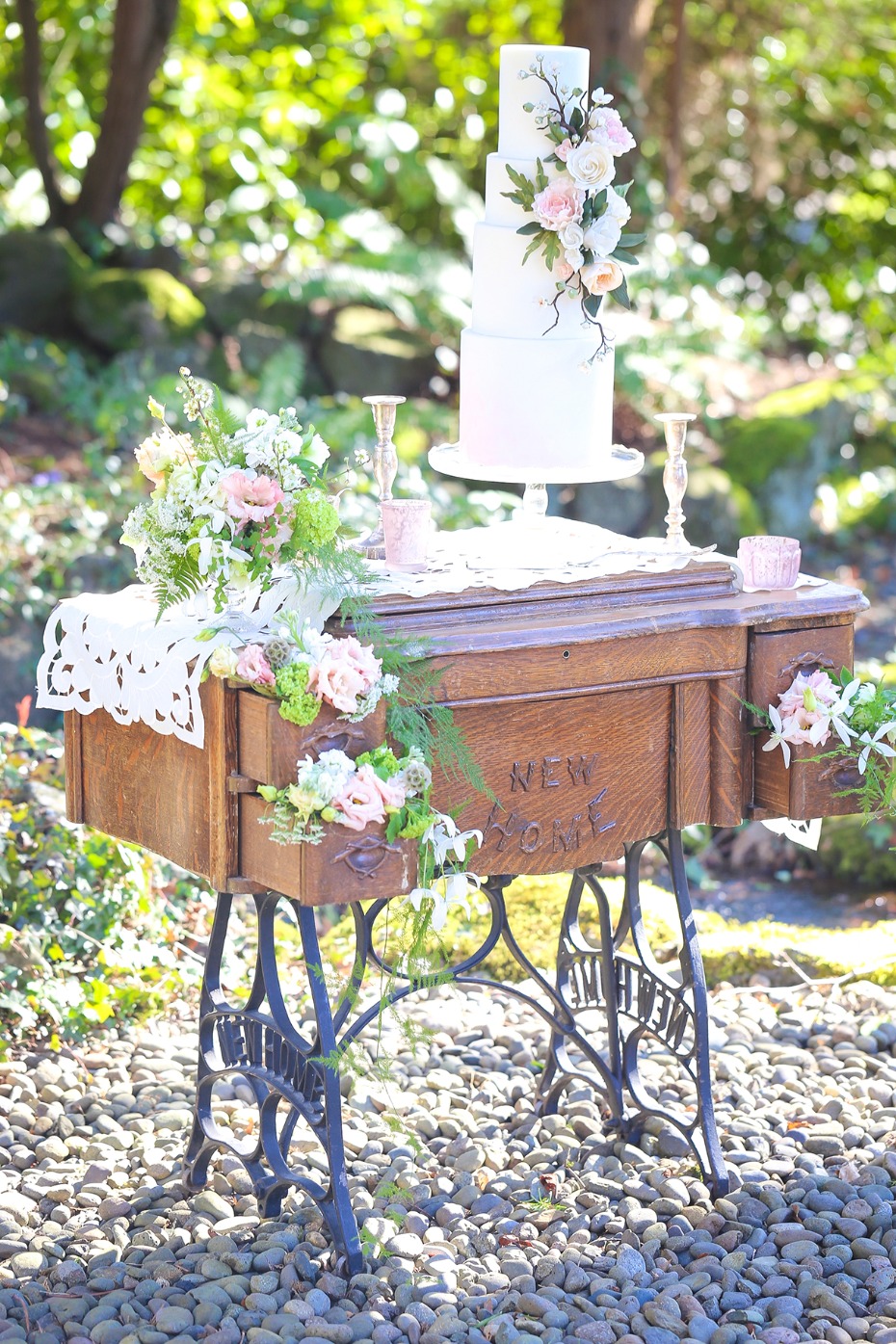Wedding cake on vintage sewing machine table