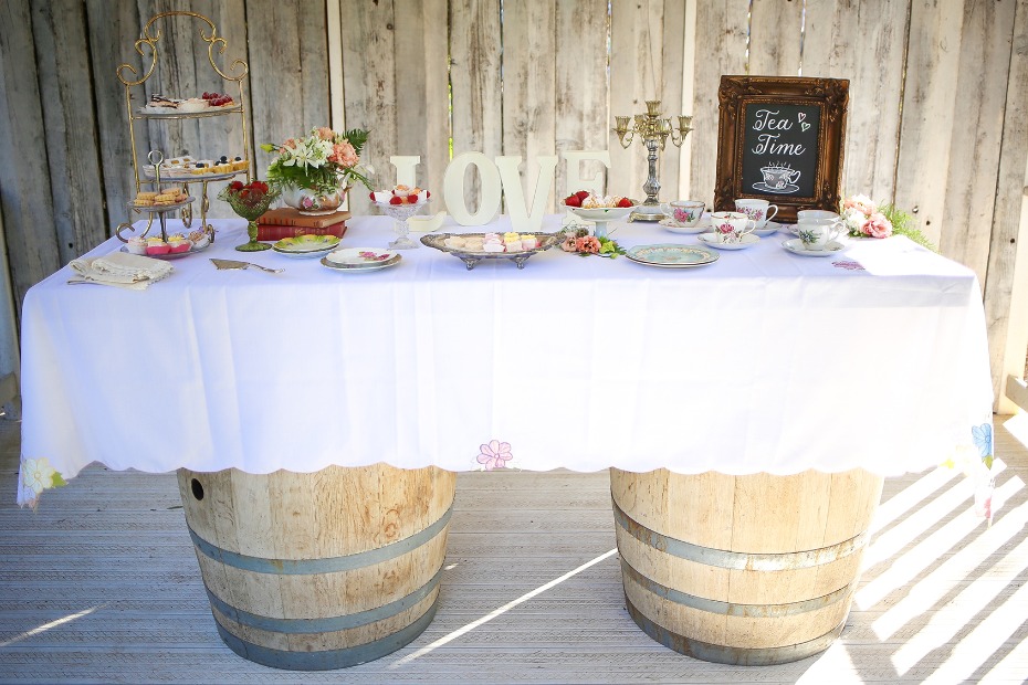 Rustic tea party table setting with LOVE sign