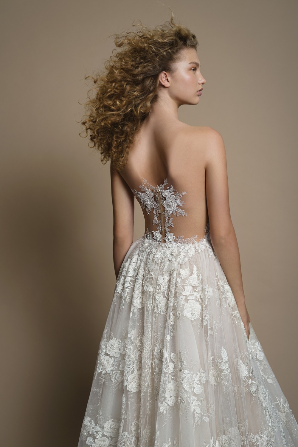 Elaborate lace ballgown featuring a sheer corset with a sheer back from Galia Lahav
