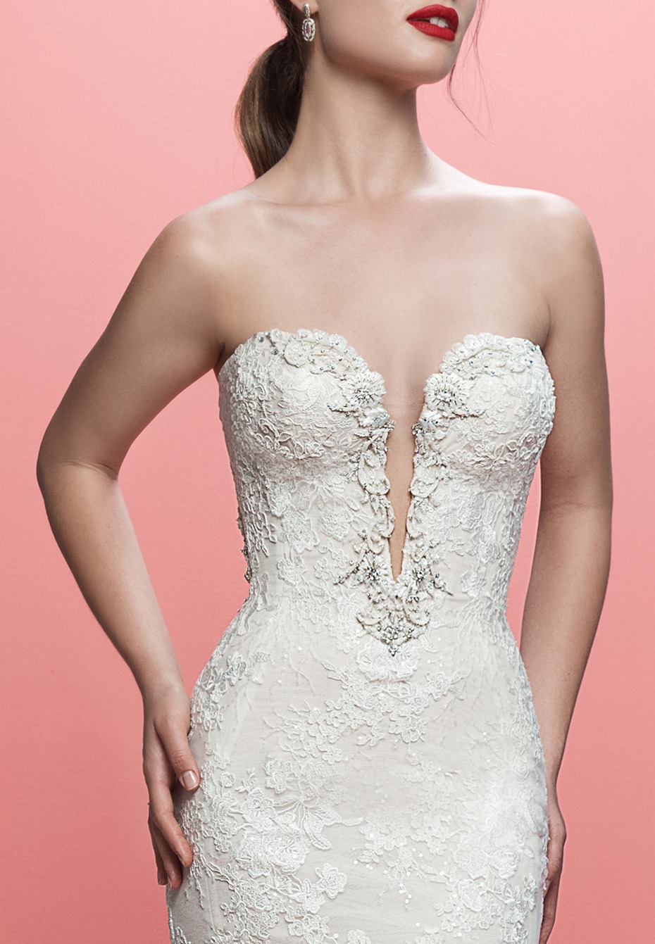 Lace strapless wedding gown with plunging neckline
