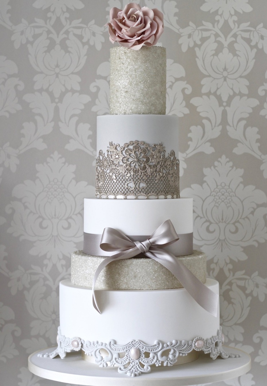 Elegant five tier wedding cake with silver details