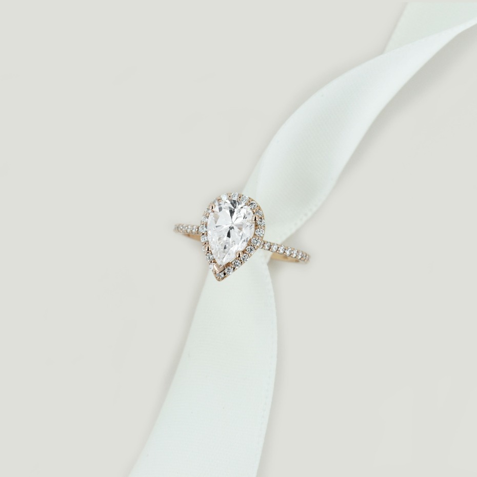 Stunning pear diamond halo ring perfect engagement gift
