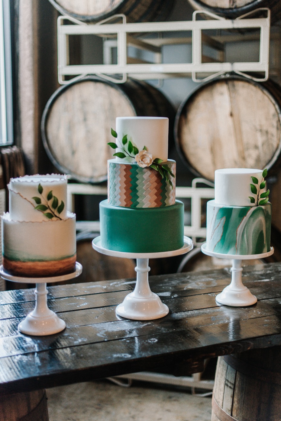 green and copper wedding cakes