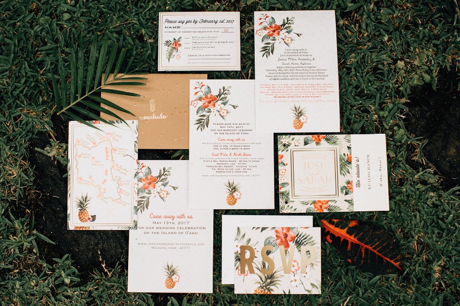Tropical wedding invitations on a grass background
