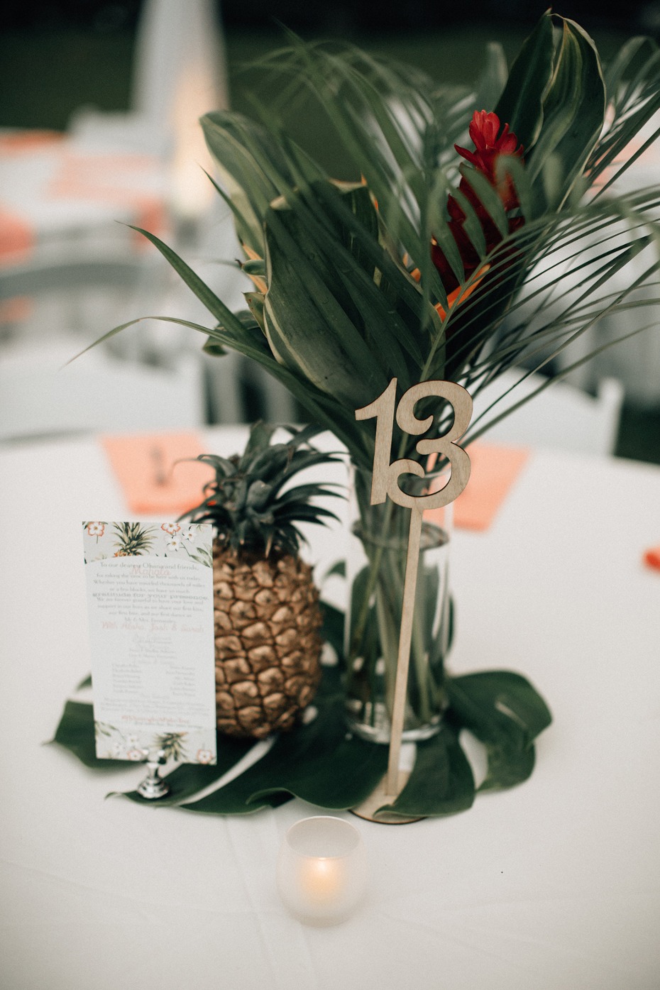 Table thirteen tropical centerpiece with pineapple decor