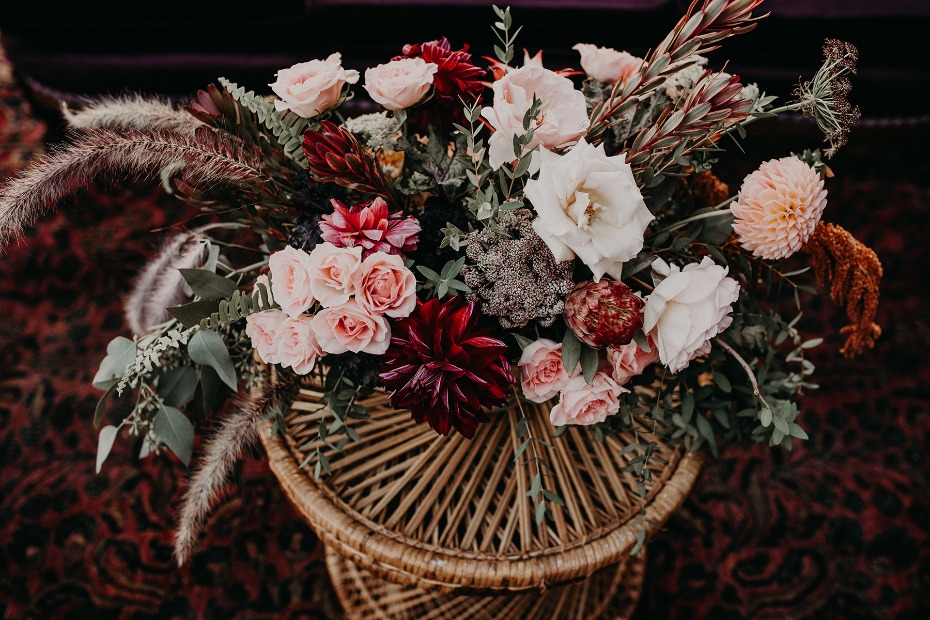 Stunning autumnal floral arrangement in a wicker basket