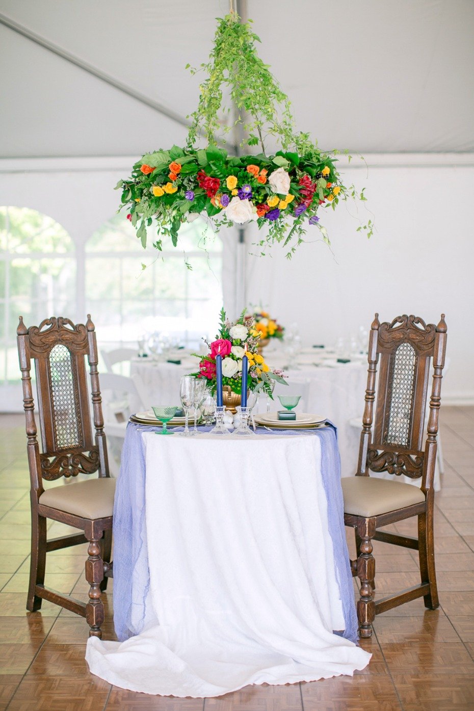 romantic sweetheart table with floral chandelier