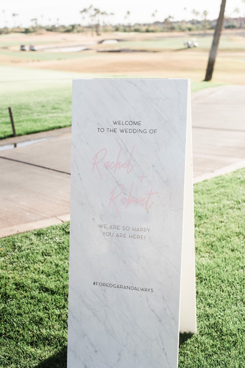 Wedding welcome sign with couple names on a golf course