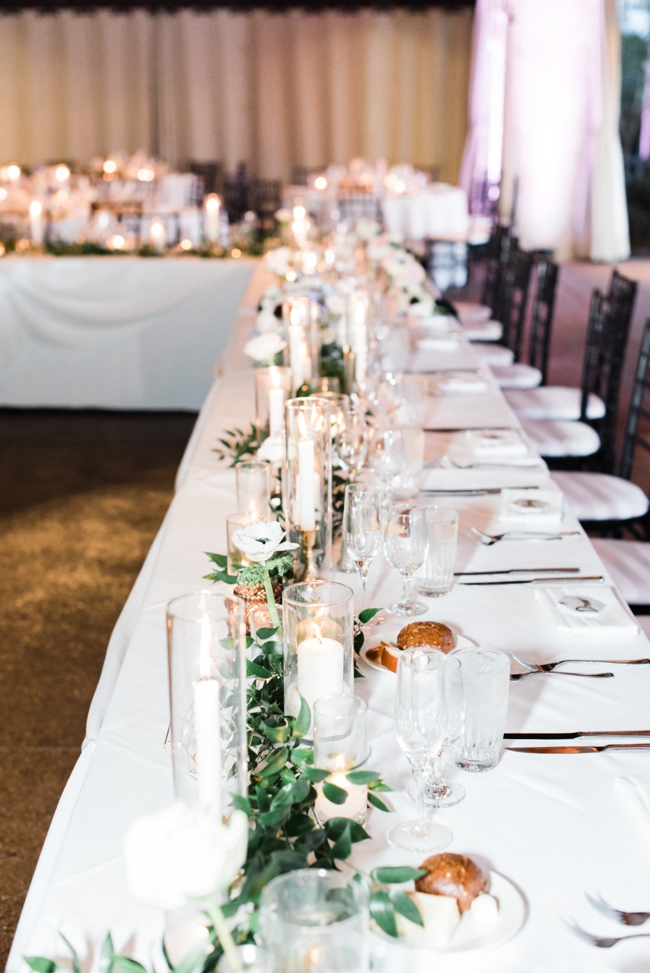Simple table decor with greenery and candles