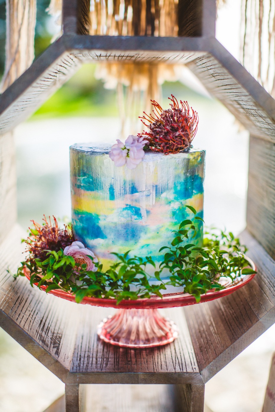 Elegant watercolor wedding cake with floral accents