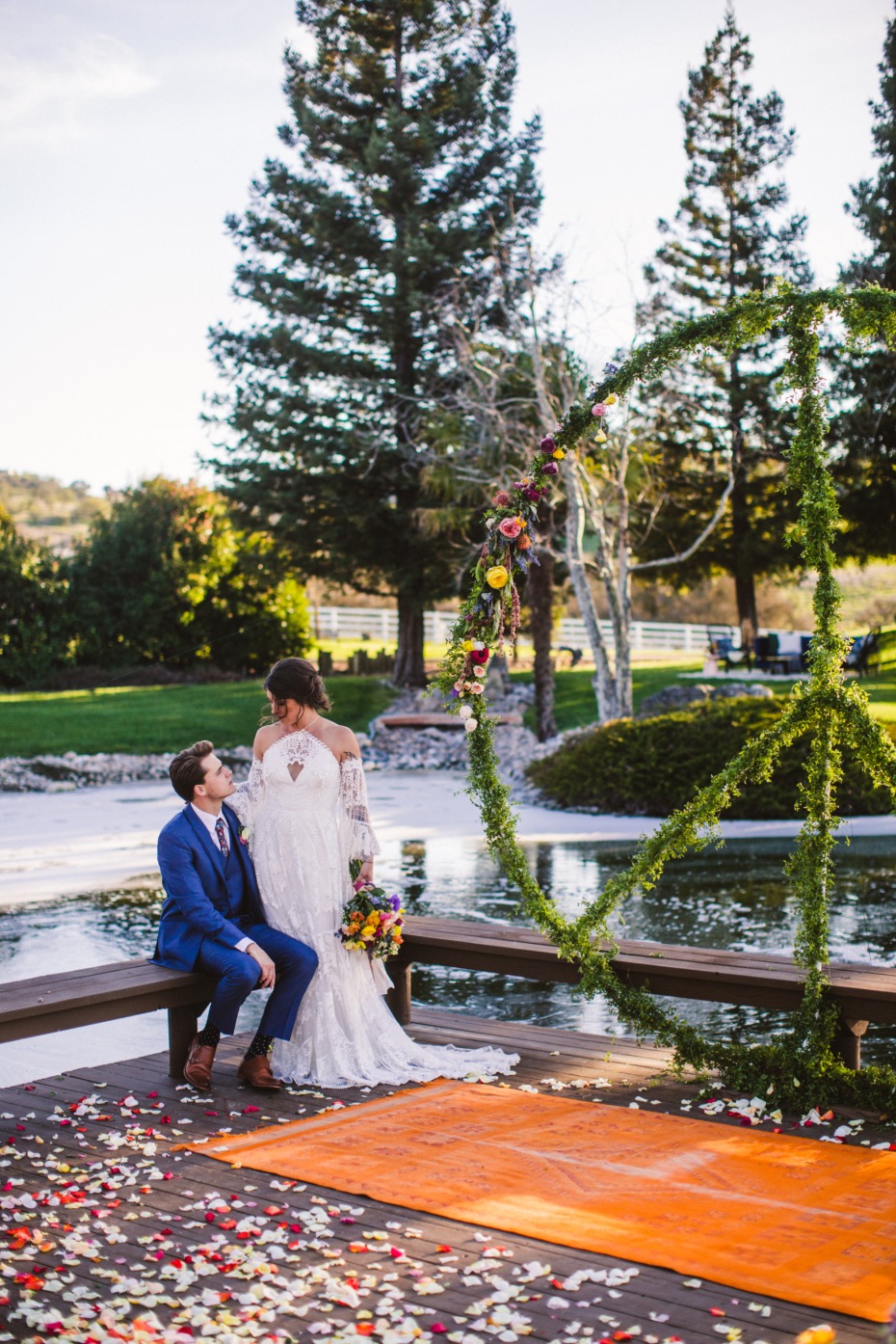 Bride and groom at a peace sign altar wedding venue