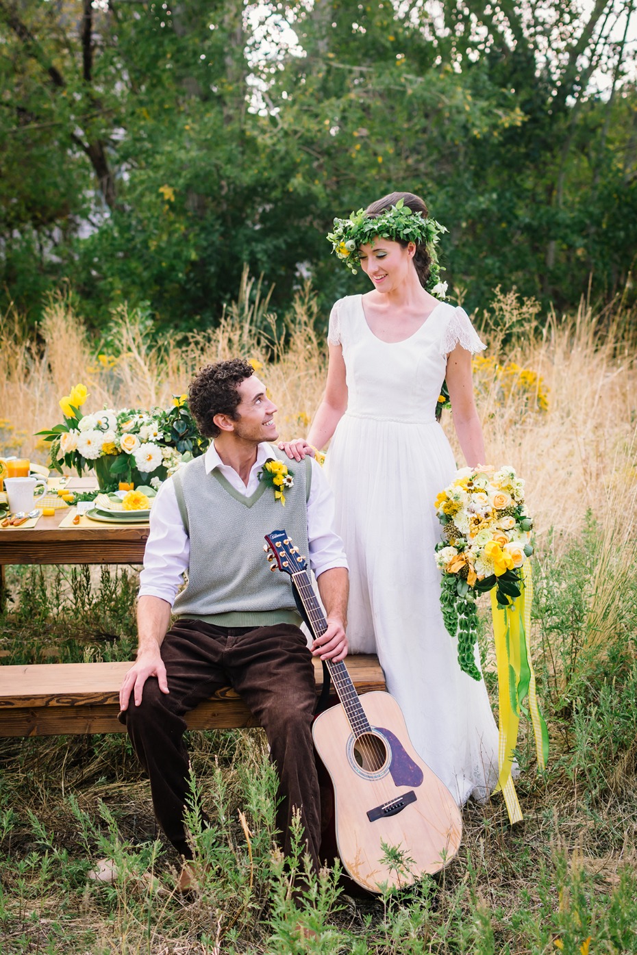Bride and groom with guitar rustic outdoor wedding