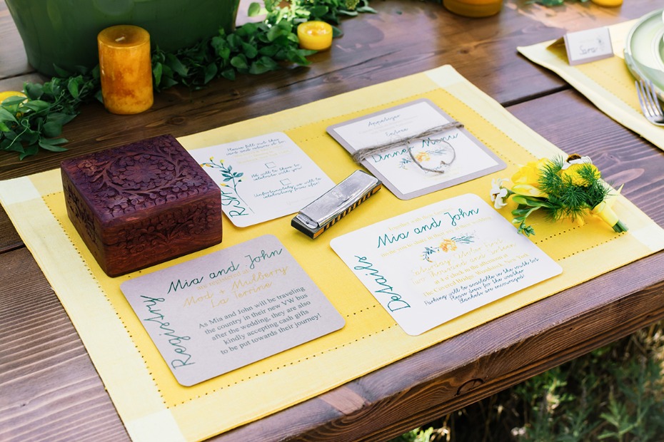 Rustic wedding table decor with invites and a wood box