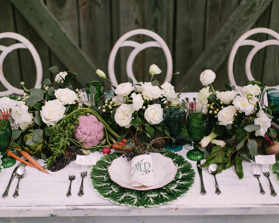 Elegant farm wedding table setting with floral decor