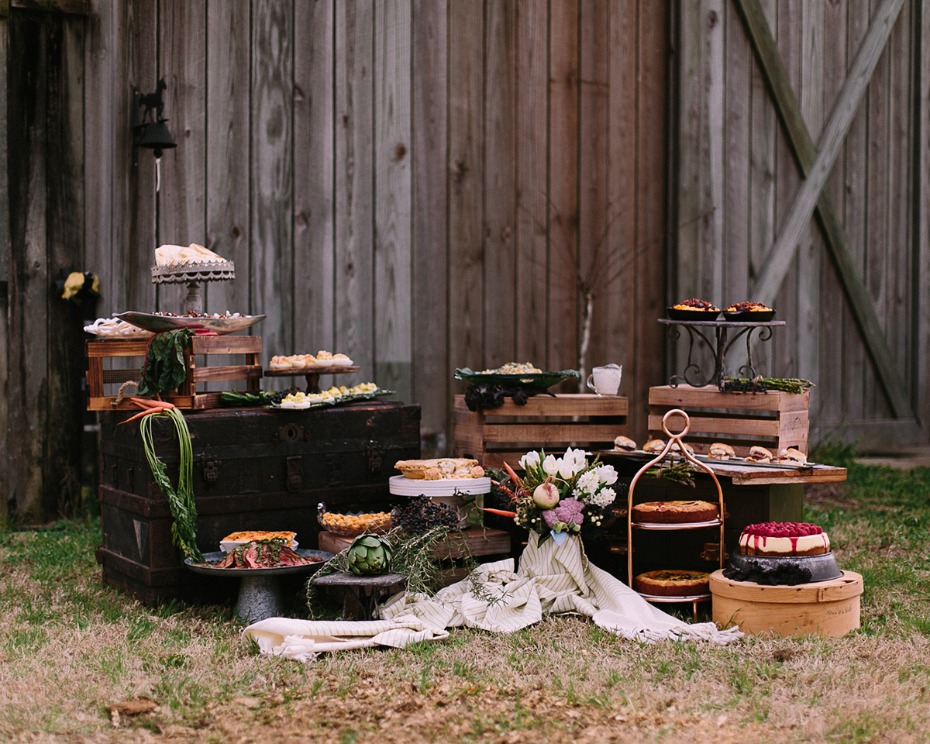 Rustic outdoor buffet with desserts and appetizers