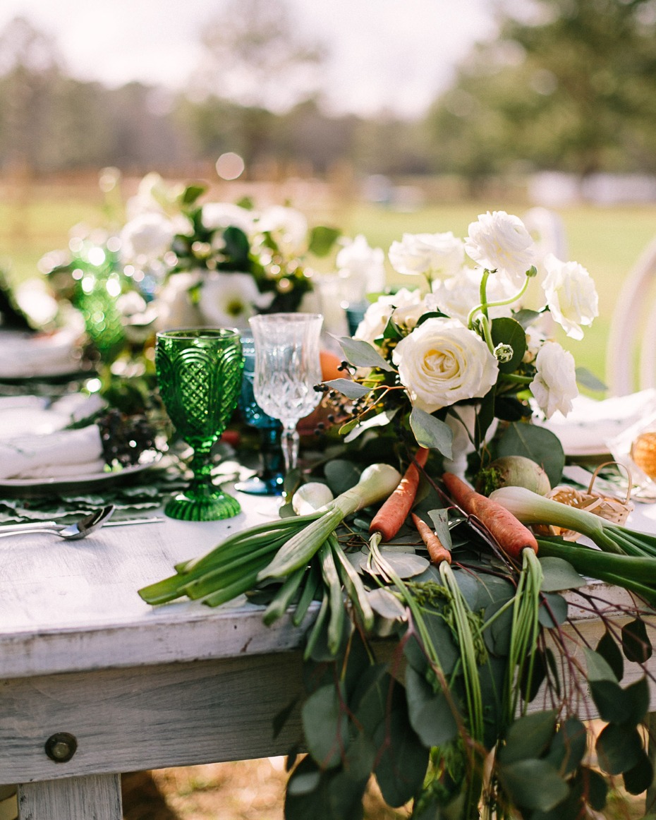 wedding centerpiece with carrots and farm vegetables