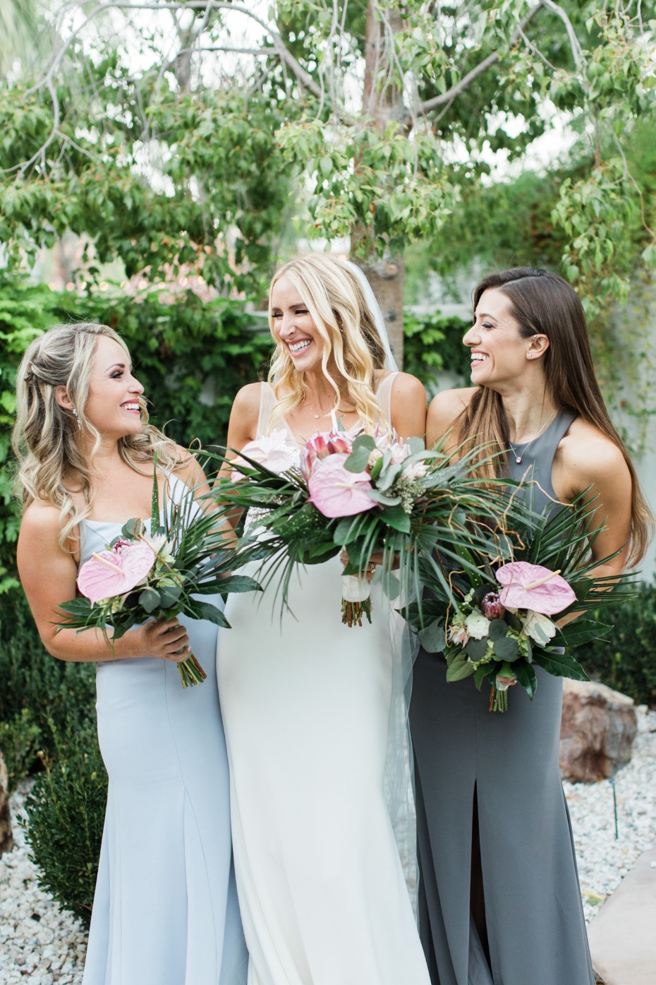 Bridesmaids in blue and grey