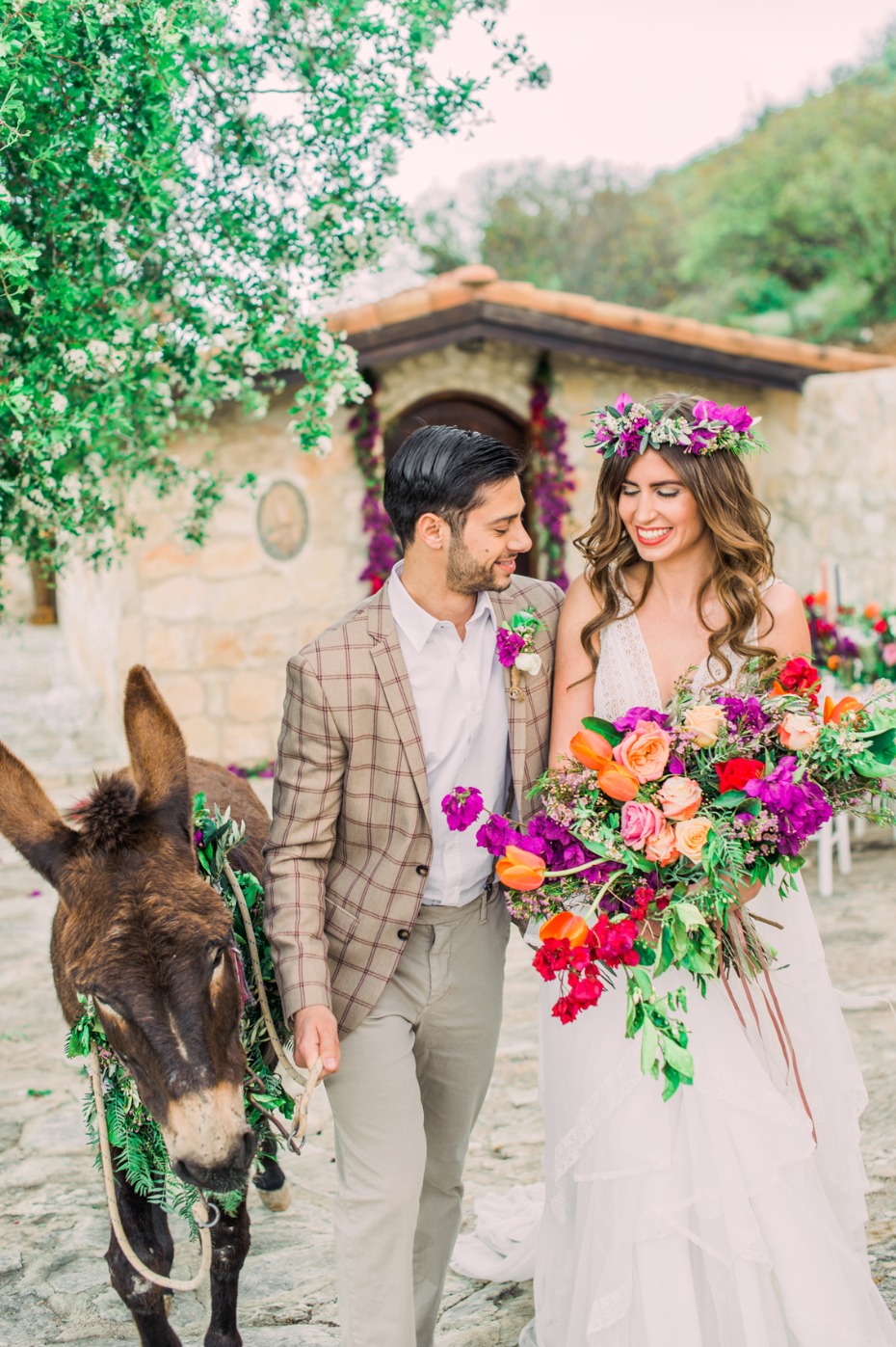 Colorful boho wedding with a donkey