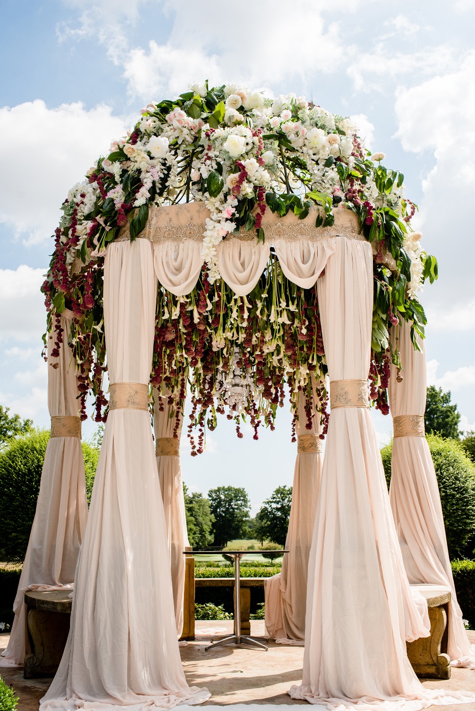 Floral covered wedding arch