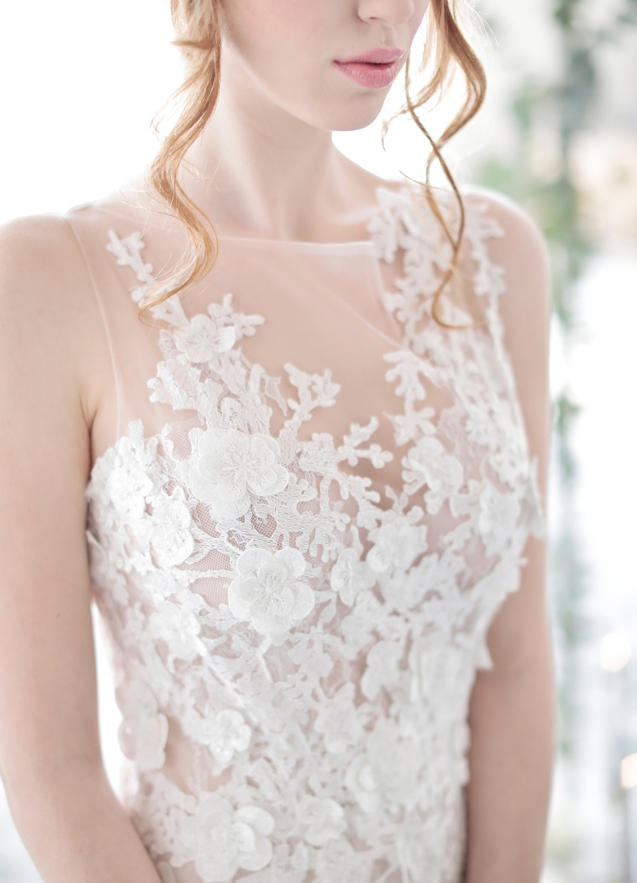 Elegant bride in delicate floral lace wedding dress