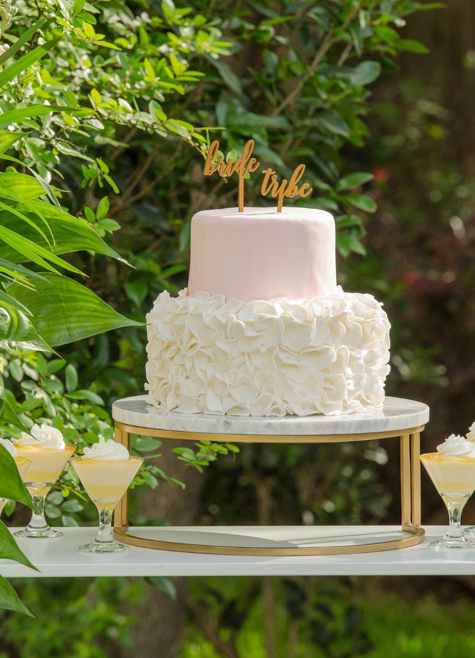 pink and ruffled wedding cake