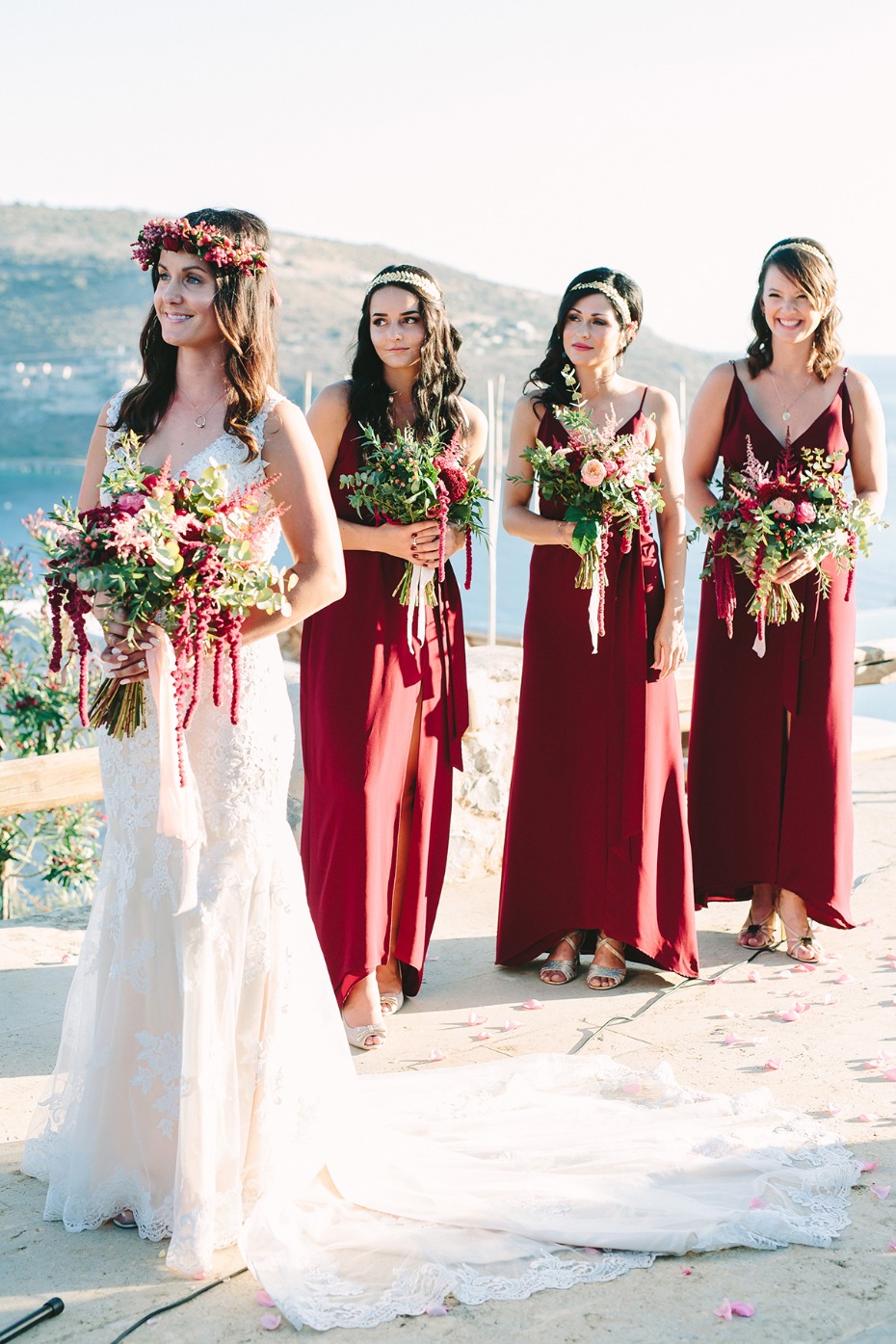bridesmaids in simple floor length burgundy dresses