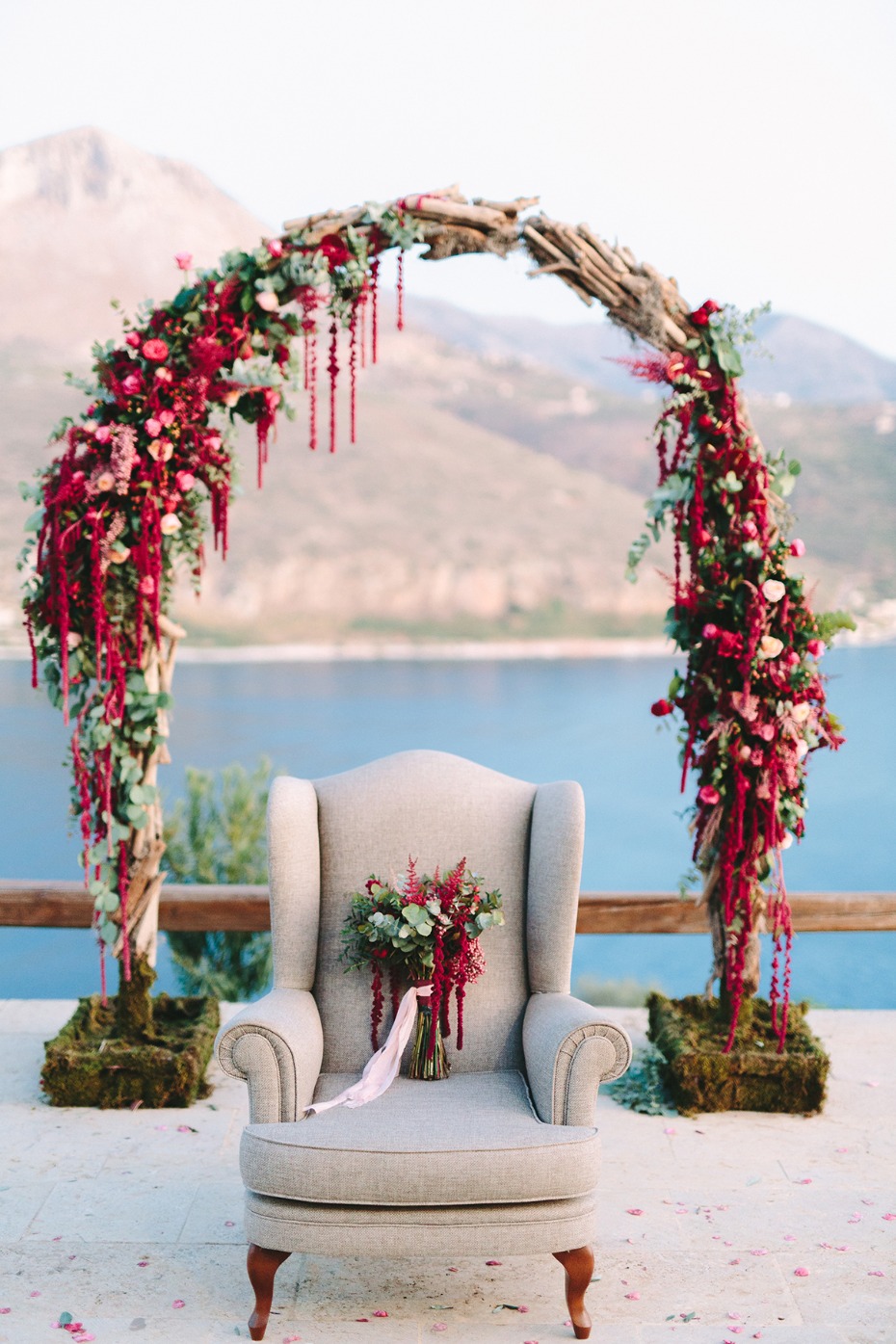 flower wedding arch and wedding bouquet