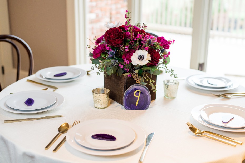 flower box and geode wedding table decor