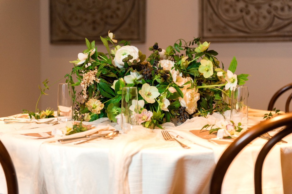 white and greenery wedding centerpiece