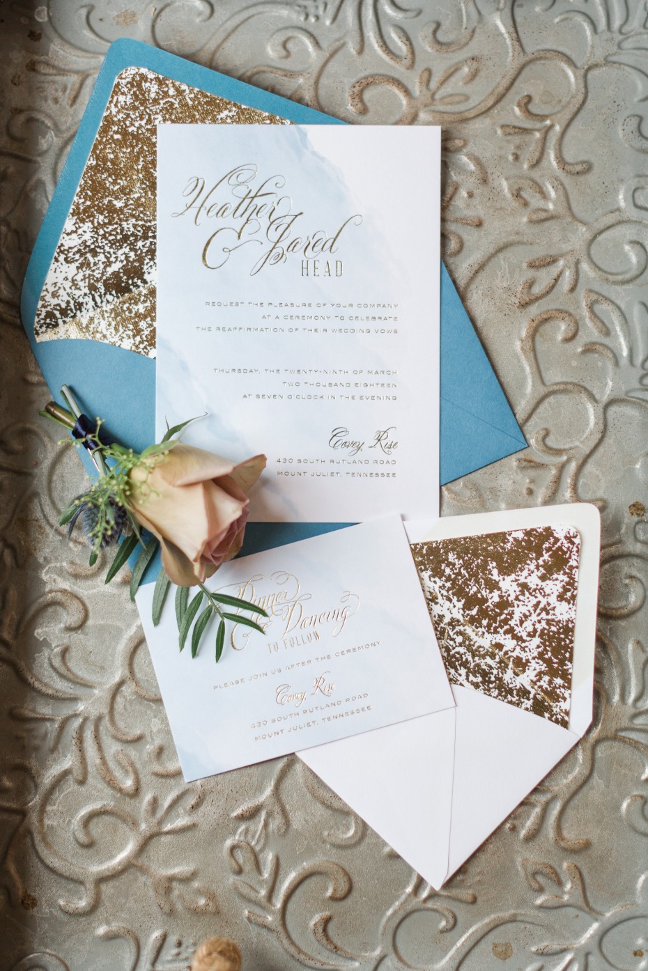 Elegant wedding invitation suite with gold foil accents