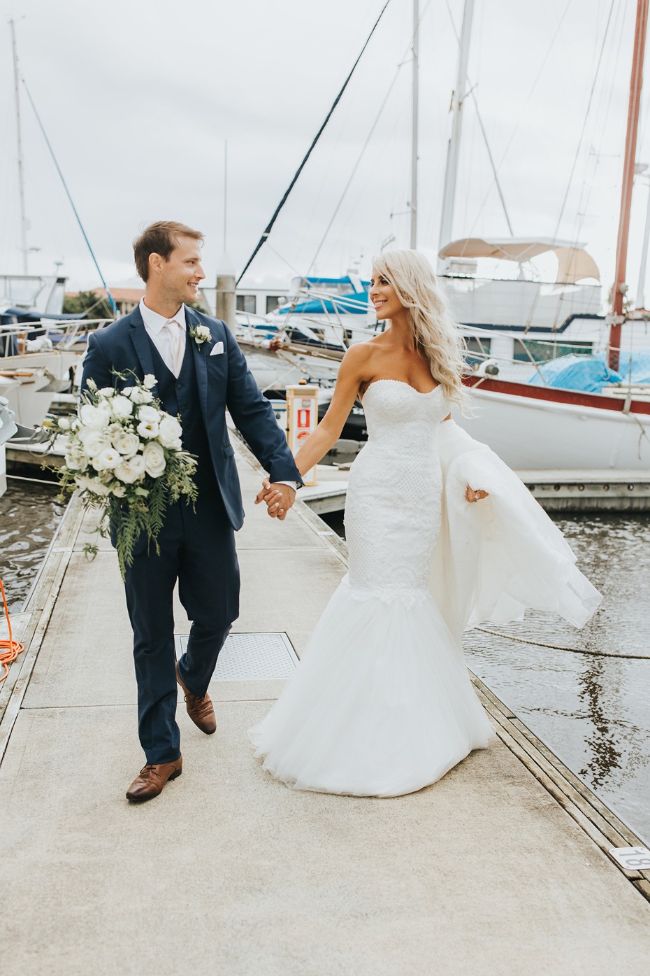 bride and groom at the dock