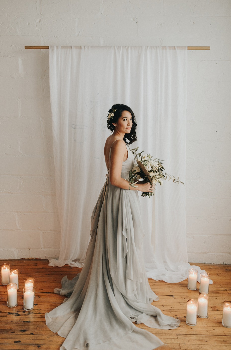 bride in elegant and modern soft grey dress