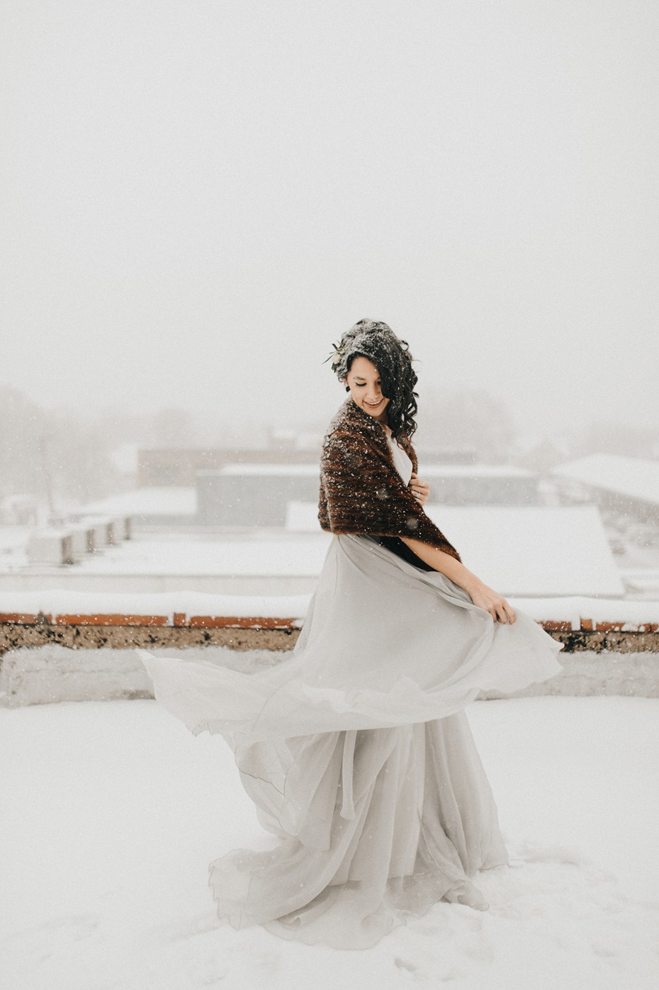 bride twirling in the snow