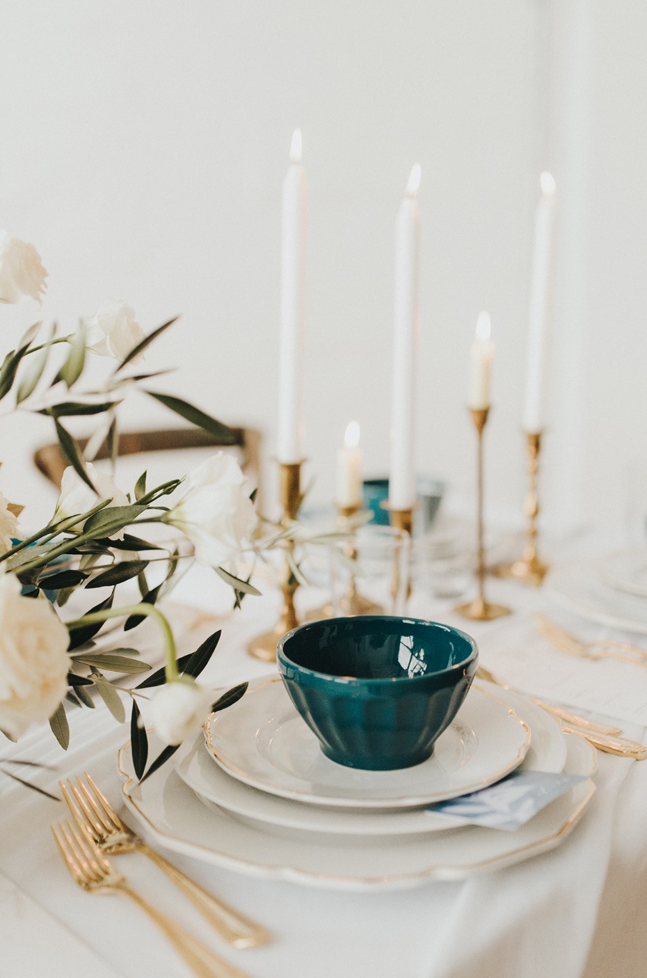 gold white and deep teal wedding table decor