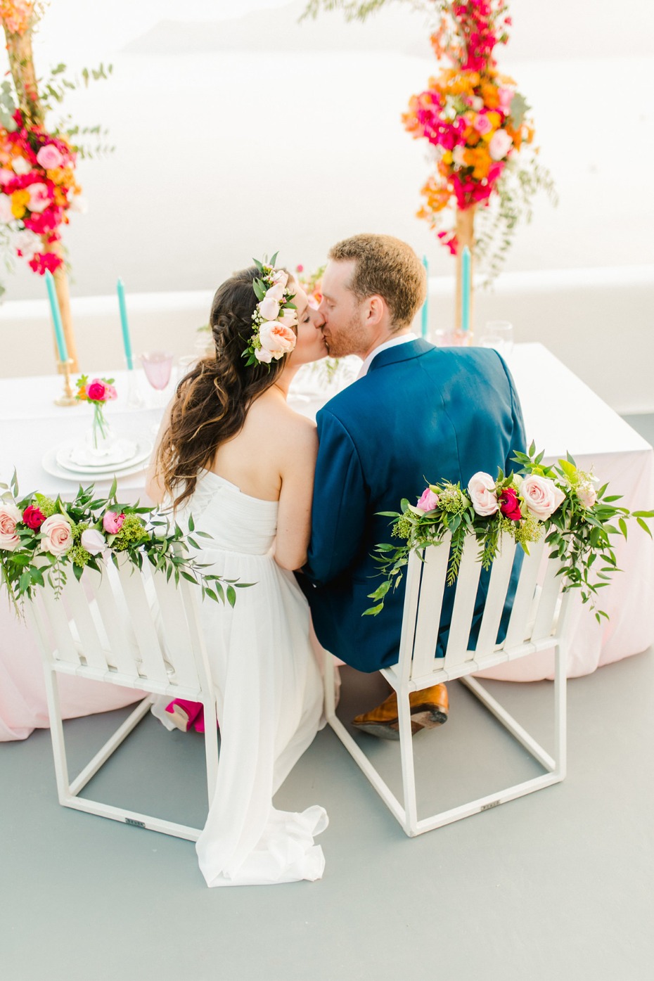 wedding kiss and flower seat accents