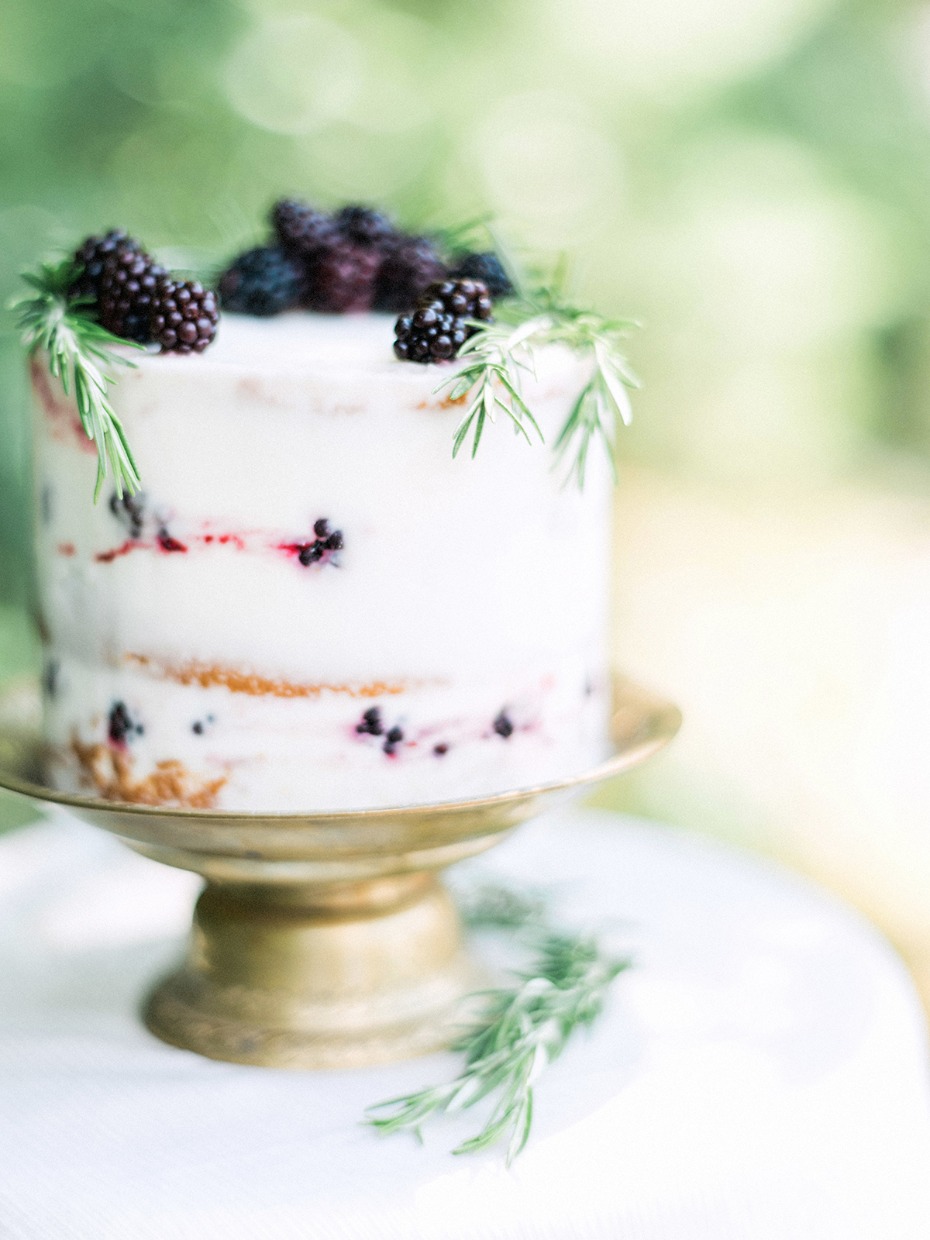 mini wedding cake topped with berries