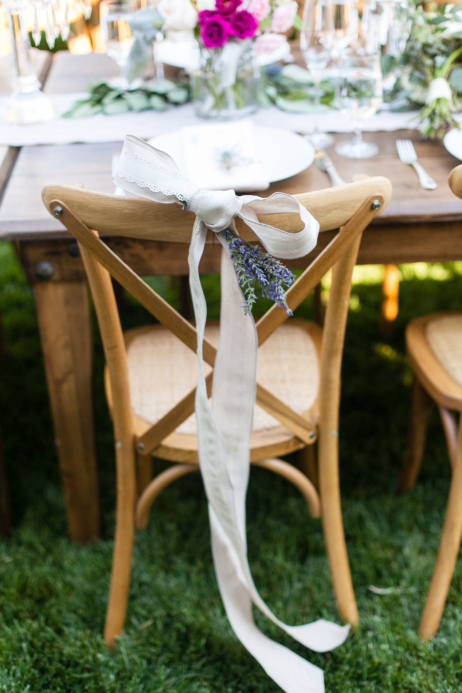 Rustic chair with ribbon and lavender for wedding decor