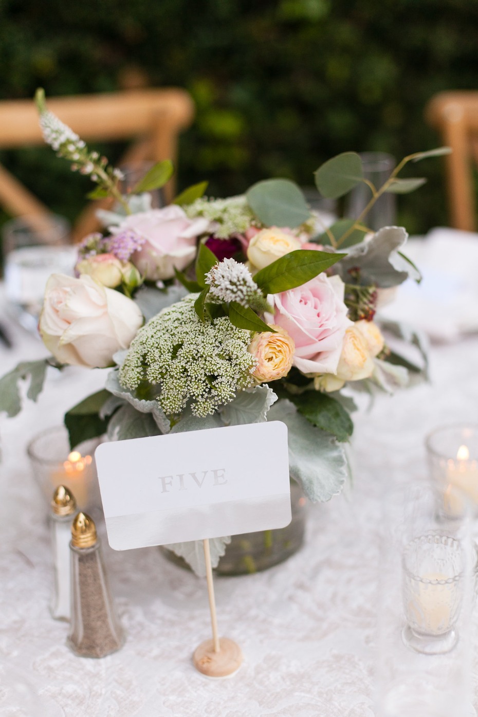 Wedding table setting with floral centerpiece number five