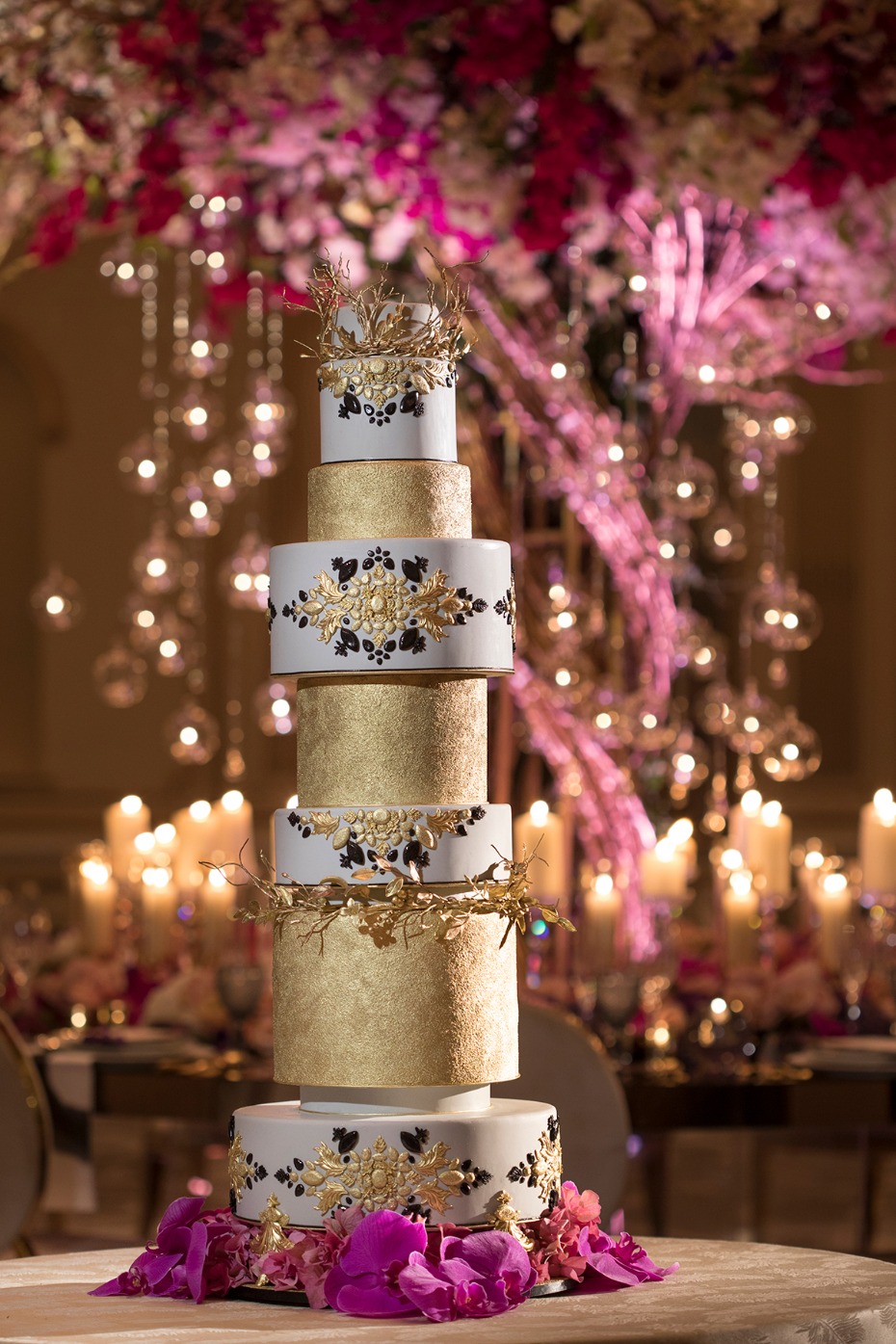 gold and black and white wedding cake